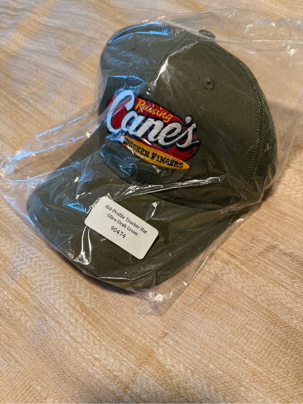 Raising Canes’ Olive Drab Trucker Hat